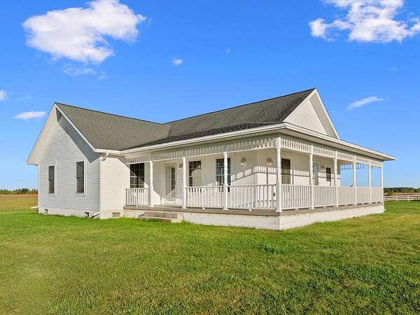 10 Acres of Land with Home for Sale in Hubbard Lake, Michigan