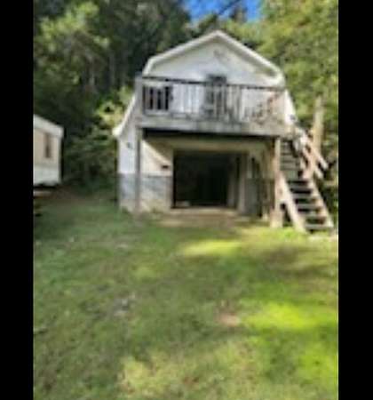 3.4 Acres of Residential Land with Home for Sale in Sevierville, Tennessee