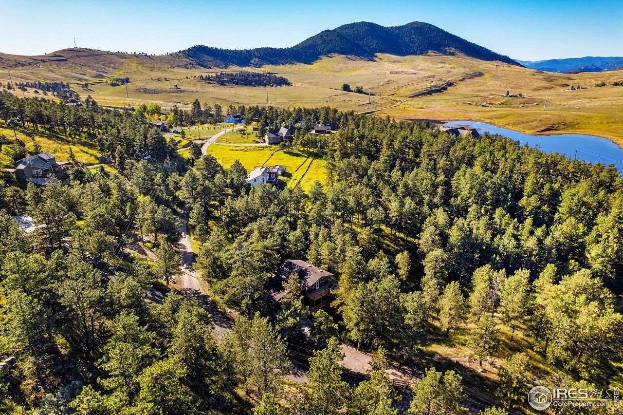 3 Acres of Land with Home for Sale in Loveland, Colorado