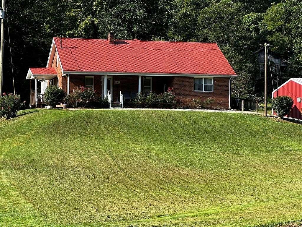 31 Acres of Land with Home for Sale in Oil Springs, Kentucky