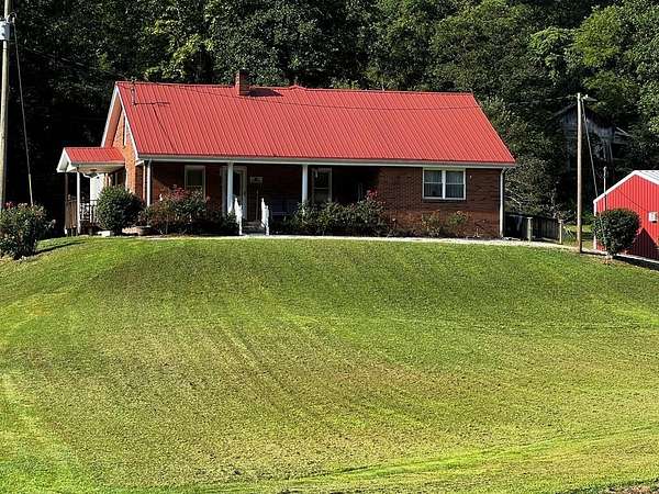 31 Acres of Land with Home for Sale in Oil Springs, Kentucky