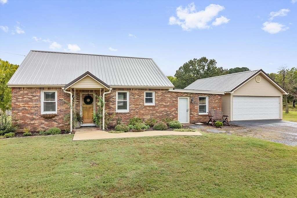 4.7 Acres of Residential Land with Home for Sale in Martin, Tennessee