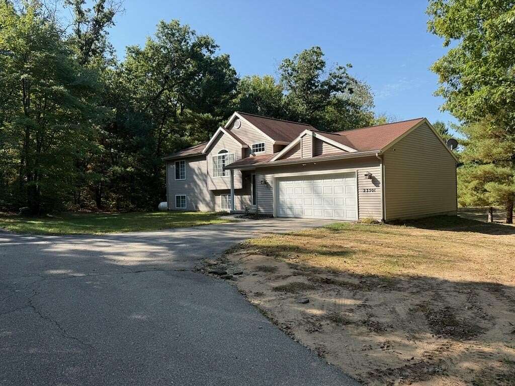 2 Acres of Residential Land with Home for Sale in Howard City, Michigan