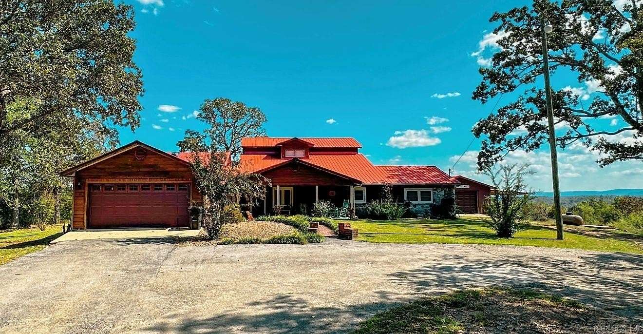 8.7 Acres of Residential Land with Home for Sale in Fiftysix, Arkansas