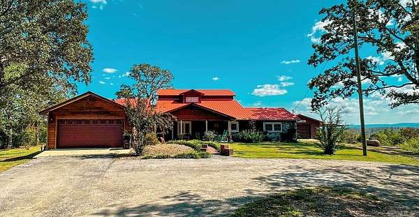 8.7 Acres of Residential Land with Home for Sale in Fiftysix, Arkansas