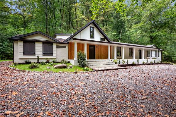 8.3 Acres of Residential Land with Home for Sale in Pegram, Tennessee