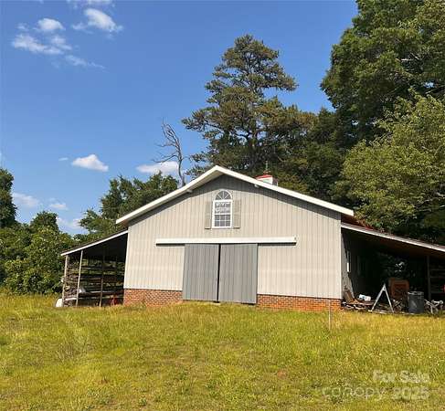 5.6 Acres of Land with Home for Sale in Concord, North Carolina