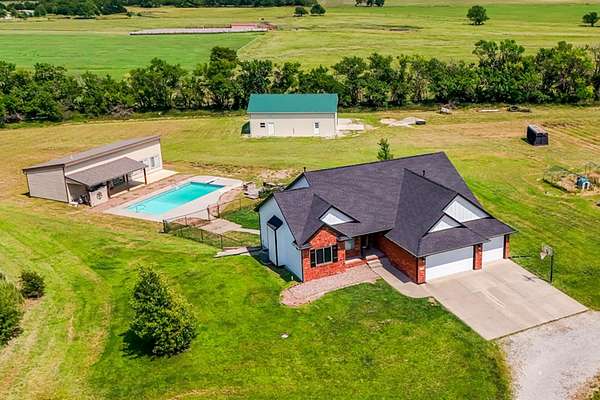 17.6 Acres of Land with Home for Auction in Rose Hill, Kansas