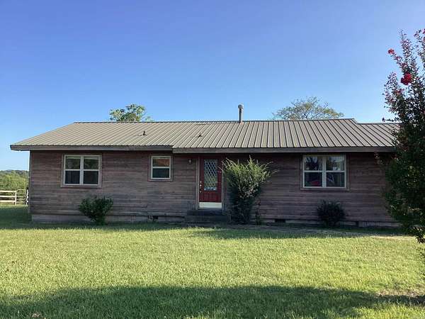5.2 Acres of Land with Home for Sale in Mena, Arkansas