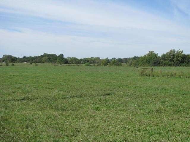 27.1 Acres of Improved Commercial Land for Sale in Gravette, Arkansas