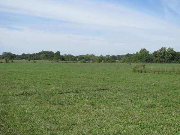 27.1 Acres of Improved Commercial Land for Sale in Gravette, Arkansas