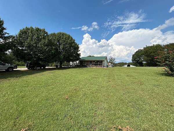 8.56 Acres of Land with Home for Auction in Ozark, Arkansas