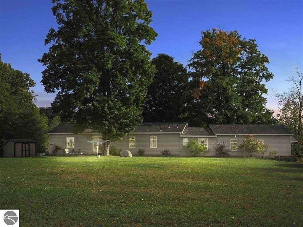 6.56 Acres of Land with Home for Sale in East Jordan, Michigan