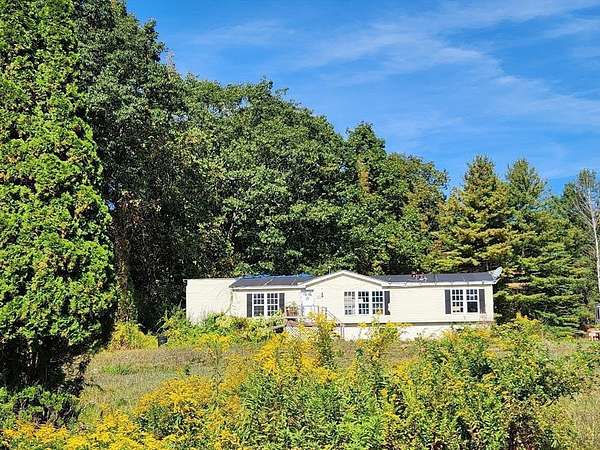 58.9 Acres of Land with Home for Sale in Charlemont, Massachusetts