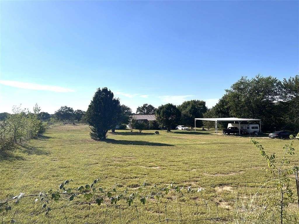 2 Acres of Residential Land with Home for Sale in Springtown, Texas