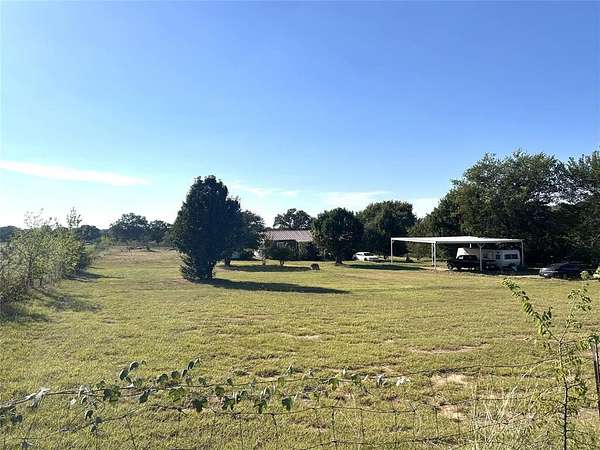 2 Acres of Residential Land with Home for Sale in Springtown, Texas