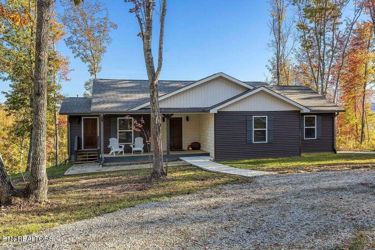 5.85 Acres of Residential Land with Home for Sale in Robbins, Tennessee