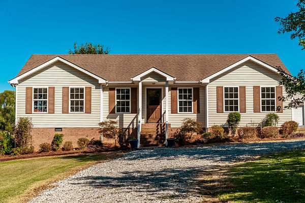 5.86 Acres of Residential Land with Home for Sale in Castalian Springs, Tennessee