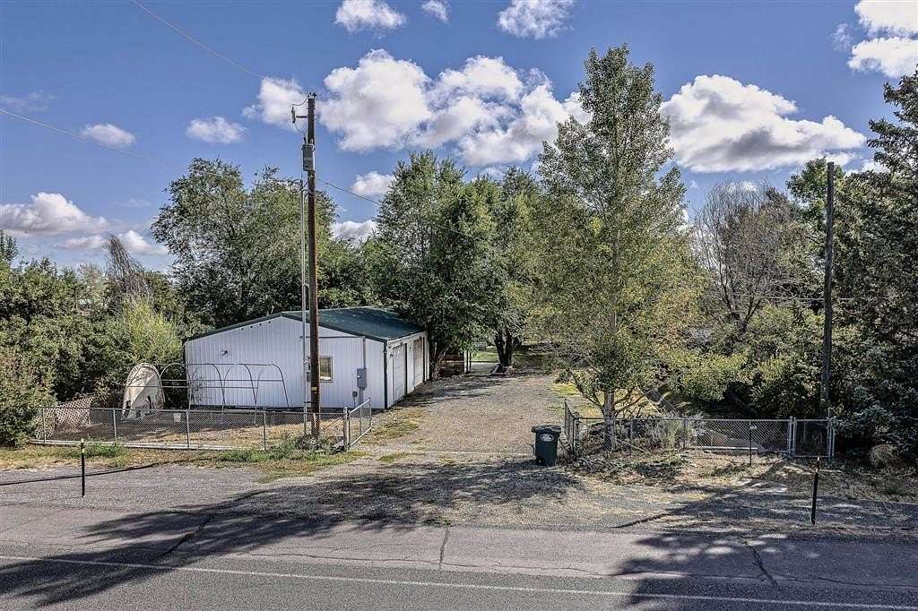 8.58 Acres of Land with Home for Sale in Powell, Wyoming