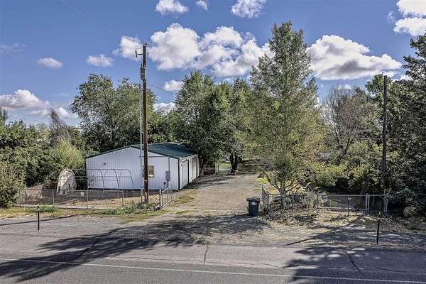 8.58 Acres of Land with Home for Sale in Powell, Wyoming