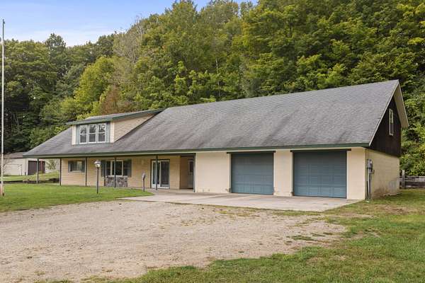 1.5 Acres of Residential Land with Home for Sale in Honor, Michigan