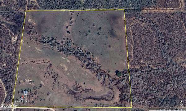 57.7 Acres of Recreational Land with Home for Sale in Jourdanton, Texas