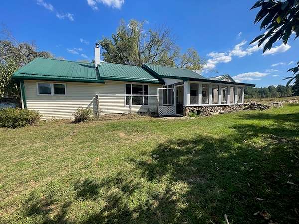 6 Acres of Residential Land with Home for Sale in Yellville, Arkansas