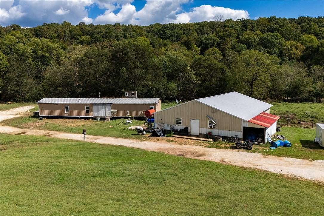 21 Acres of Agricultural Land with Home for Sale in Prairie Grove, Arkansas