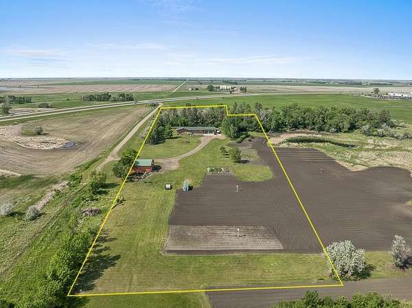 5 Acres of Land with Home for Sale in Minot, North Dakota