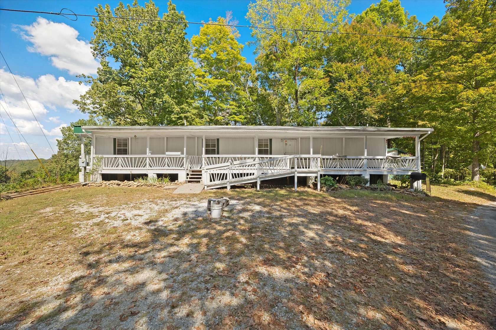 5.7 Acres of Residential Land with Home for Sale in Celina, Tennessee