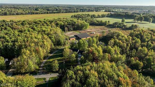 20.4 Acres of Agricultural Land with Home for Sale in Rock Creek, Ohio
