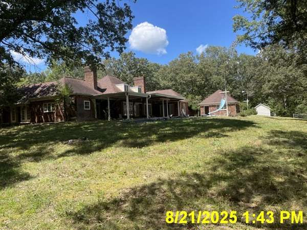 7 Acres of Residential Land with Home for Sale in Camden, Tennessee