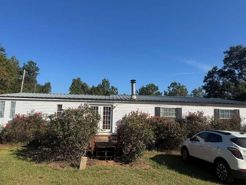 7 Acres of Land with Home for Sale in Clayton, Alabama