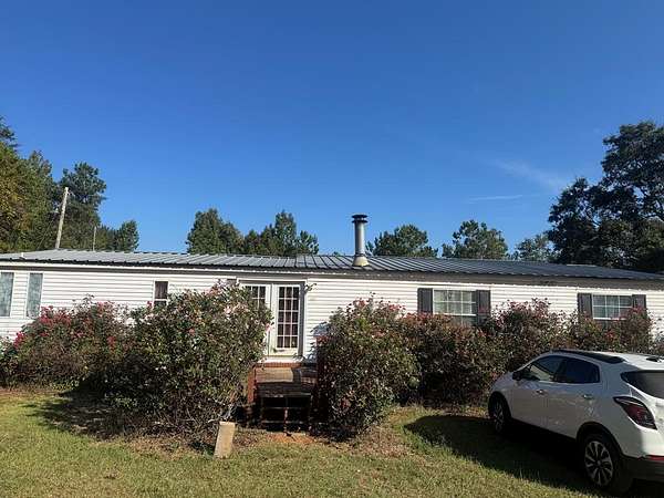 7 Acres of Land with Home for Sale in Clayton, Alabama