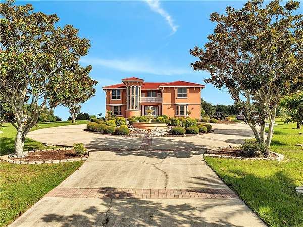 4.63 Acres of Residential Land with Home for Sale in Groveland, Florida