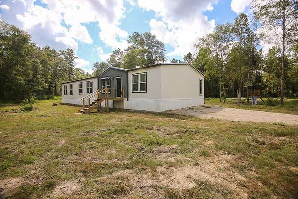 4.9 Acres of Residential Land with Home for Sale in Warren, Texas