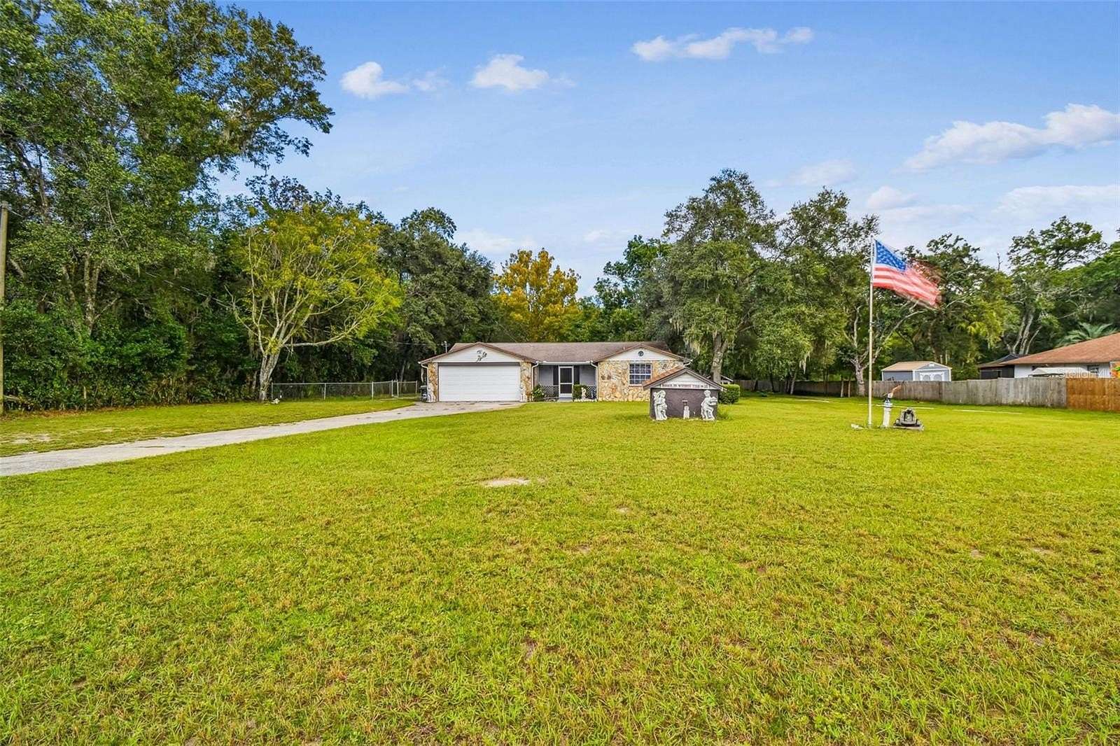 1.78 Acres of Land with Home for Sale in New Port Richey, Florida