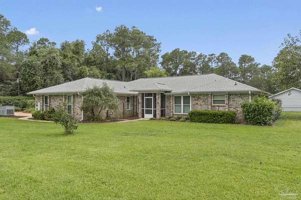 4 Acres of Residential Land with Home for Sale in Pace, Florida