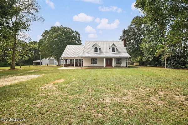 79.7 Acres of Agricultural Land with Home for Sale in Lucedale, Mississippi