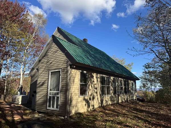 87.3 Acres of Recreational Land with Home for Sale in Barton, Vermont