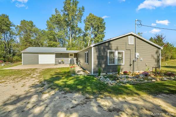 80 Acres of Recreational Land with Home for Sale in White Cloud, Michigan