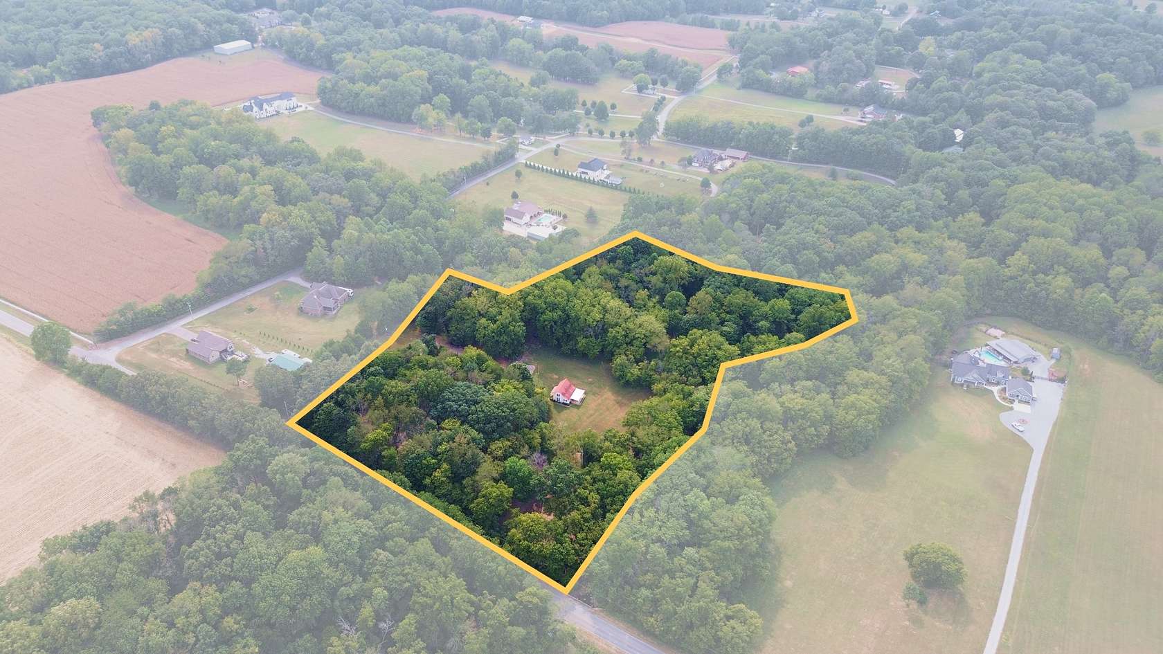 9.13 Acres of Residential Land with Home for Sale in Portland, Tennessee