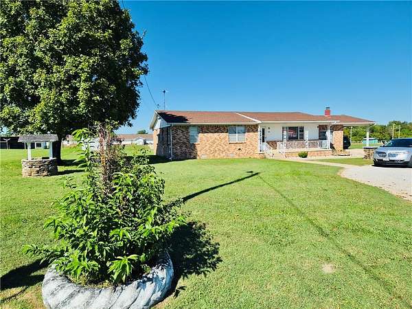 1.5 Acres of Land with Home for Sale in Green Forest, Arkansas