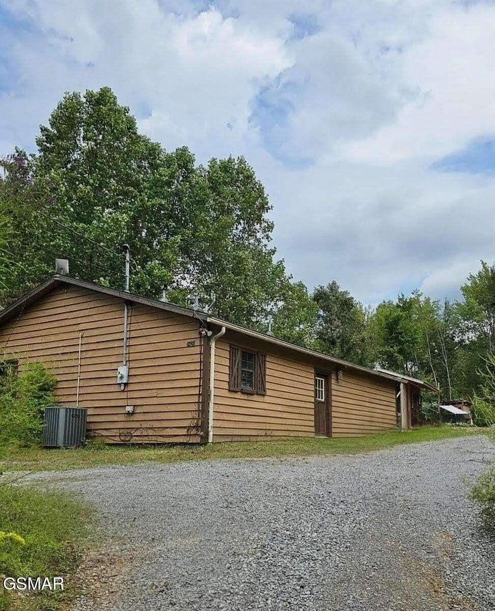 5 Acres of Residential Land with Home for Sale in Sevierville, Tennessee