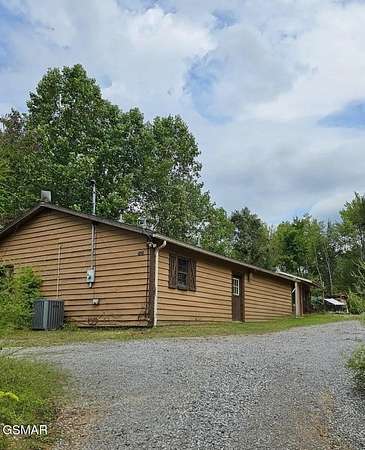 5 Acres of Residential Land with Home for Sale in Sevierville, Tennessee