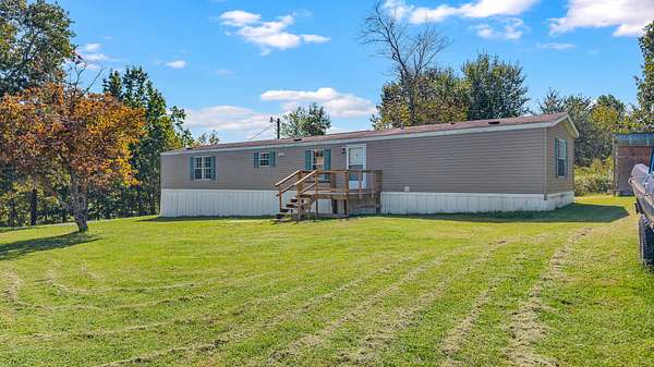 1.5 Acres of Land with Home for Sale in Sweetwater, Tennessee