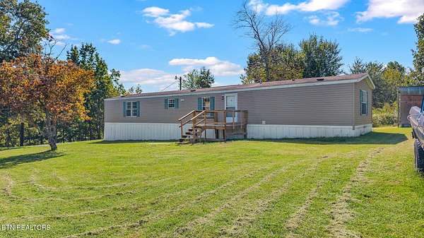 1.5 Acres of Land with Home for Sale in Sweetwater, Tennessee