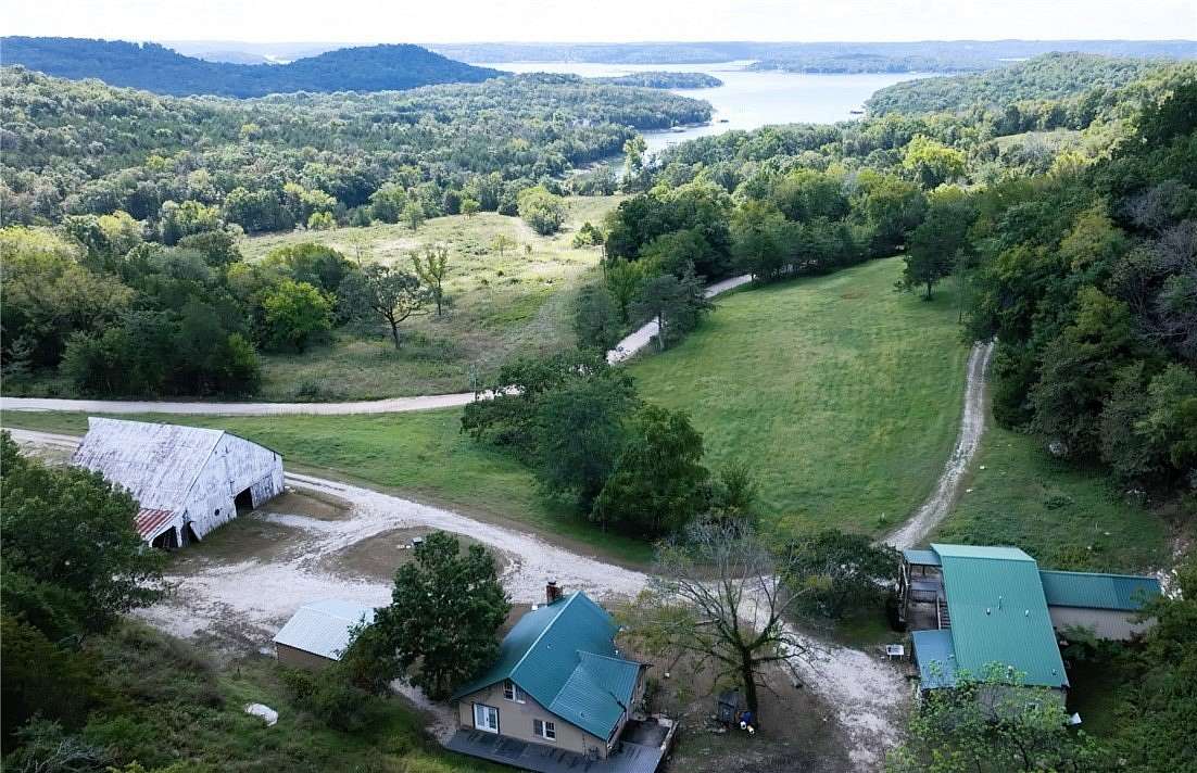 175 Acres of Recreational Land with Home for Sale in Garfield, Arkansas