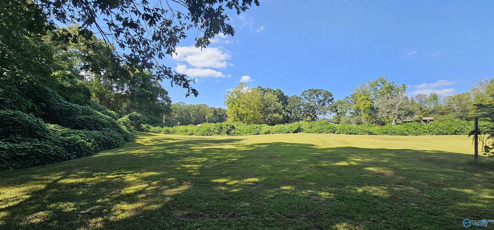 5.7 Acres of Residential Land with Home for Sale in Scottsboro, Alabama