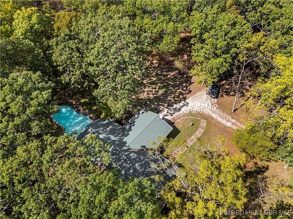 12.9 Acres of Land with Home for Sale in Camdenton, Missouri